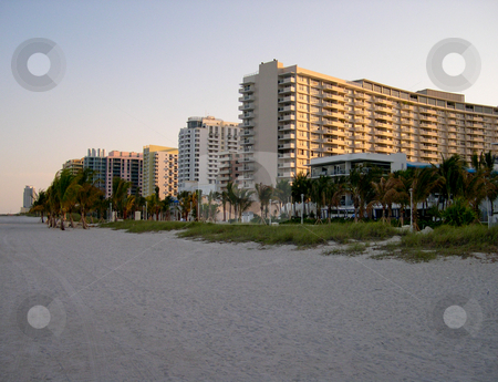 To use this stock image in your creative project, please select the size you need over to the right and click the "Add to Cart" button.
Your downloaded image will come with the Cutcaster watermark removed so don’t worry about the watermark you see on this page. Miami Beach stock photo, Buildings and beach in Miami Florida by Jaime Pharr