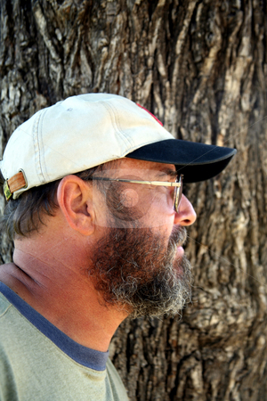 To use this stock image in your creative project, please select the size you need over to the right and click the "Add to Cart" button.
Your downloaded image will come with the Cutcaster watermark removed so don’t worry about the watermark you see on this page. Bearded senior profile stock photo, Profile of a retired gentleman by Stacy Barnett
