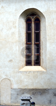 To use this stock image in your creative project, please select the size you need over to the right and click the "Add to Cart" button.
Your downloaded image will come with the Cutcaster watermark removed so don’t worry about the watermark you see on this page. Gothic window stock photo, Old Gothic window with white gray facade by Juraj Kovacik