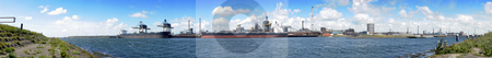 To use this stock image in your creative project, please select the size you need over to the right and click the "Add to Cart" button.
Your downloaded image will come with the Cutcaster watermark removed so don’t worry about the watermark you see on this page. Industrial Skyline stock photo, The industrial skyline of a huge steel plant, with two bulk carriers with coal and iron ore being unloaded by Corepics VOF