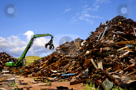 To use this stock image in your creative project, please select the size you need over to the right and click the "Add to Cart" button.
Your downloaded image will come with the Cutcaster watermark removed so don’t worry about the watermark you see on this page. Steel recycling stock photo, A green digger, used to move metal scrap by Corepics VOF