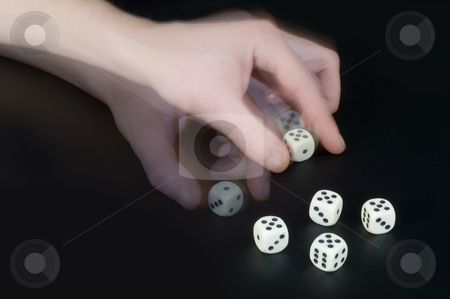 To use this stock image in your creative project, please select the size you need over to the right and click the "Add to Cart" button.
Your downloaded image will come with the Cutcaster watermark removed so don’t worry about the watermark you see on this page. Cheating stock photo, A man cheating whilst playing dice, turning a dice to his advantage by Corepics VOF