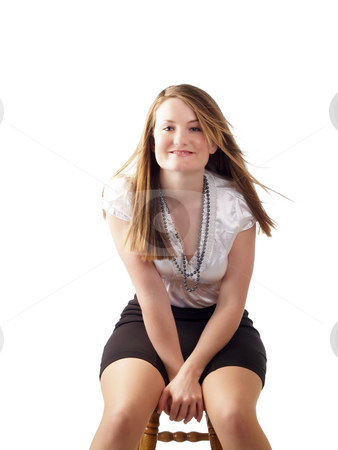 To use this stock image in your creative project, please select the size you need over to the right and click the "Add to Cart" button.
Your downloaded image will come with the Cutcaster watermark removed so don’t worry about the watermark you see on this page. Young woman in black skirt sitting on stool stock photo, Young woman in white blouse and black skirt sitting by Jeff Cleveland