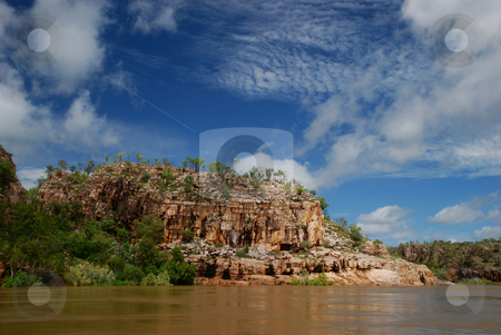 To use this stock image in your creative project, please select the size you need over to the right and click the "Add to Cart" button.
Your downloaded image will come with the Cutcaster watermark removed so don’t worry about the watermark you see on this page. Gorge jutting out to river stock photo, View of gorge jutting out into river on a sunny day by Emma White