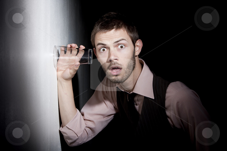 To use this stock image in your creative project, please select the size you need over to the right and click the "Add to Cart" button.
Your downloaded image will come with the Cutcaster watermark removed so don’t worry about the watermark you see on this page. Handsome young man using glass to eavesdrop stock photo, Handsome young man using glass against wall to eavesdrop by Scott Griessel