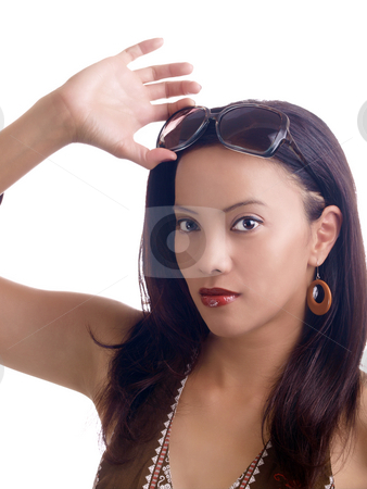 To use this stock image in your creative project, please select the size you need over to the right and click the "Add to Cart" button.
Your downloaded image will come with the Cutcaster watermark removed so don’t worry about the watermark you see on this page. Young hispanic woman with sunglasses on top of head stock photo, Young latina woman holding sunglasses up above forehead by Jeff Cleveland