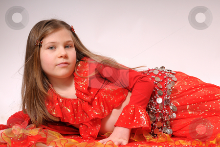 To use this stock image in your creative project, please select the size you need over to the right and click the "Add to Cart" button.
Your downloaded image will come with the Cutcaster watermark removed so don’t worry about the watermark you see on this page. Gipsy girl stock photo, Portrait of gipsy girl with red dress by Dragos Iliescu