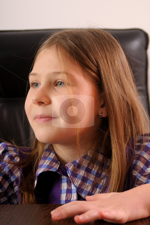 To use this stock image in your creative project, please select the size you need over to the right and click the "Add to Cart" button.
Your downloaded image will come with the Cutcaster watermark removed so don’t worry about the watermark you see on this page. Girl in office stock photo, Little girl sitting in a black chair by Dragos Iliescu