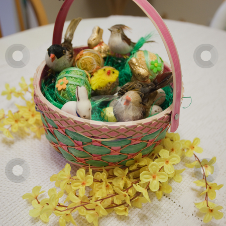 To use this stock image in your creative project, please select the size you need over to the right and click the "Add to Cart" button.
Your downloaded image will come with the Cutcaster watermark removed so don’t worry about the watermark you see on this page. Easter basket stock photo, Easter basket filled with real or artificial straw to resemble a bird's nest. by Mariusz Jurgielewicz