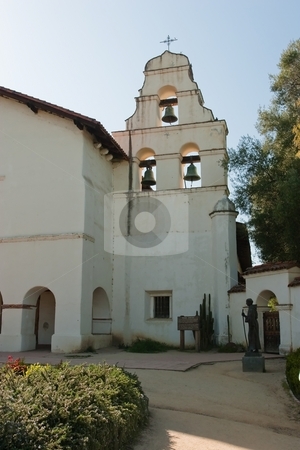 To use this stock image in your creative project, please select the size you need over to the right and click the "Add to Cart" button.
Your downloaded image will come with the Cutcaster watermark removed so don’t worry about the watermark you see on this page. Mission San Juan Bautista stock photo, Mission San Juan Bautista was founded on June 24, 1797 in what is now the San Juan Bautista Historic District of San Juan Bautista, California. Barracks for the soldiers, a nunnery, the Jose Castro House, and other buildings were constructed around a large grassy plaza in front of the church and can be seen today in their original form. by Mariusz Jurgielewicz