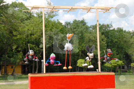 To use this stock image in your creative project, please select the size you need over to the right and click the "Add to Cart" button.
Your downloaded image will come with the Cutcaster watermark removed so don’t worry about the watermark you see on this page. Puppets animals stock photo, Puppets animals hanging on wooden slat outdoor by Julija Sapic
