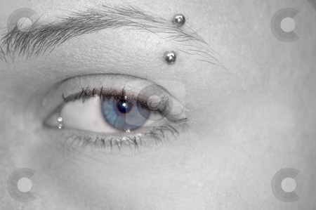 To use this stock image in your creative project, please select the size you need over to the right and click the "Add to Cart" button.
Your downloaded image will come with the Cutcaster watermark removed so don’t worry about the watermark you see on this page. One Closeup Dramatic Eye stock photo, This is a closeup of a dramatic eye complete with eyebrow piercing. It's a black and white with only the iris blue showing through. by Valerie Garner