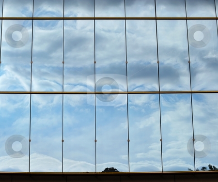 To use this stock image in your creative project, please select the size you need over to the right and click the "Add to Cart" button.
Your downloaded image will come with the Cutcaster watermark removed so don’t worry about the watermark you see on this page. Sky on glass stock photo, Blue sky and curly clouds reflection on a glass facade by Juraj Kovacik
