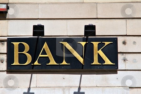 To use this stock image in your creative project, please select the size you need over to the right and click the "Add to Cart" button.
Your downloaded image will come with the Cutcaster watermark removed so don’t worry about the watermark you see on this page. Bank sign stock photo, Metal bank sign on black and slightly obsolete facade by Juraj Kovacik