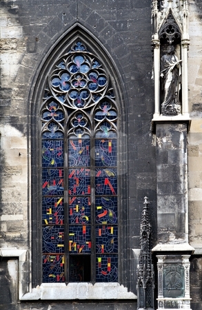 To use this stock image in your creative project, please select the size you need over to the right and click the "Add to Cart" button.
Your downloaded image will come with the Cutcaster watermark removed so don’t worry about the watermark you see on this page. Gothic window stainglass stock photo, Gothic window detail with modern stainglass by Juraj Kovacik