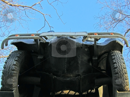 To use this stock image in your creative project, please select the size you need over to the right and click the "Add to Cart" button.
Your downloaded image will come with the Cutcaster watermark removed so don’t worry about the watermark you see on this page. Underneath of car stock photo, Underneath of the car against blue sky by Sergej Razvodovskij