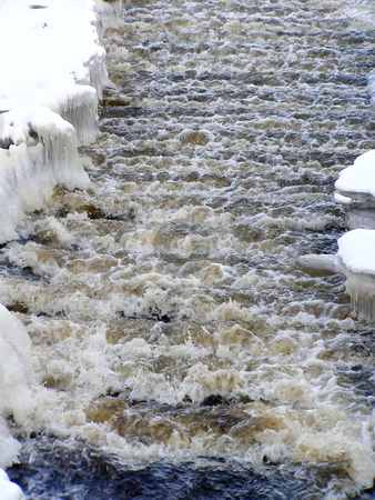 To use this stock image in your creative project, please select the size you need over to the right and click the "Add to Cart" button.
Your downloaded image will come with the Cutcaster watermark removed so don’t worry about the watermark you see on this page. Winter stream with snow stock photo, Stream of water run through the white snow by Sergej Razvodovskij