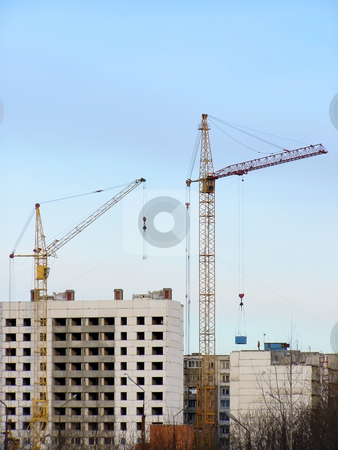 To use this stock image in your creative project, please select the size you need over to the right and click the "Add to Cart" button.
Your downloaded image will come with the Cutcaster watermark removed so don’t worry about the watermark you see on this page. Buildings and cranes stock photo, Buildings and cranes in the growth part of town by Sergej Razvodovskij
