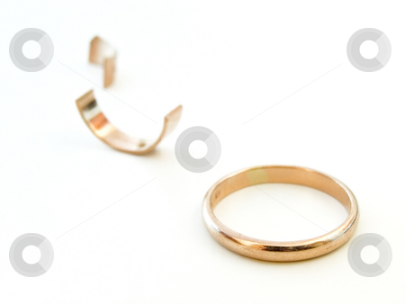 To use this stock image in your creative project, please select the size you need over to the right and click the "Add to Cart" button.
Your downloaded image will come with the Cutcaster watermark removed so don’t worry about the watermark you see on this page. Broken ring stock photo, Golden ring with the pieces of gold against the white background by Sergej Razvodovskij