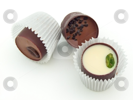 To use this stock image in your creative project, please select the size you need over to the right and click the "Add to Cart" button.
Your downloaded image will come with the Cutcaster watermark removed so don’t worry about the watermark you see on this page. Sweets stock photo, Different chocolate sweets against the white background by Sergej Razvodovskij