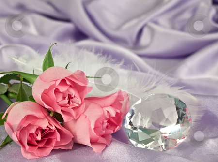To use this stock image in your creative project, please select the size you need over to the right and click the "Add to Cart" button.
Your downloaded image will come with the Cutcaster watermark removed so don’t worry about the watermark you see on this page. Rosebuds and diamond stock photo, Three pink rosebuds and a diamond lying on lilac satin by Norma Cornes