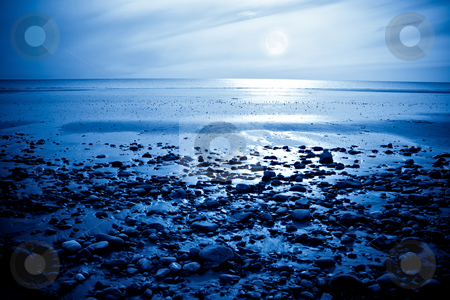 To use this stock image in your creative project, please select the size you need over to the right and click the "Add to Cart" button.
Your downloaded image will come with the Cutcaster watermark removed so don’t worry about the watermark you see on this page. Moonlight Bay stock photo, The rising moon reflected in the ocean from a beautiful bay by Norma Cornes