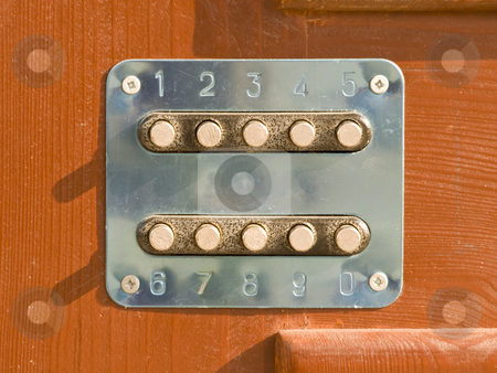 To use this stock image in your creative project, please select the size you need over to the right and click the "Add to Cart" button.
Your downloaded image will come with the Cutcaster watermark removed so don’t worry about the watermark you see on this page. Code key stock photo, Code key lock at the wood brown door by Sergej Razvodovskij