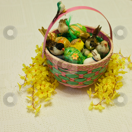 To use this stock image in your creative project, please select the size you need over to the right and click the "Add to Cart" button.
Your downloaded image will come with the Cutcaster watermark removed so don’t worry about the watermark you see on this page. Easter basket stock photo, Easter basket filled with real or artificial straw to resemble a bird's nest. by Mariusz Jurgielewicz