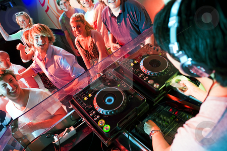To use this stock image in your creative project, please select the size you need over to the right and click the "Add to Cart" button.
Your downloaded image will come with the Cutcaster watermark removed so don’t worry about the watermark you see on this page. Disco party stock photo, Group of dancing people in front of a dj in a discotheque by Corepics VOF