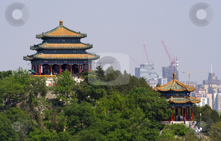 To use this stock image in your creative project, please select the size you need over to the right and click the "Add to Cart" button.
Your downloaded image will come with the Cutcaster watermark removed so don’t worry about the watermark you see on this page. Jingshan Park Pavilions Beijing, China stock photo, Picture of Jingshan Park Pavilions taken from Beihai Park. Jingshan Park is directly in back of the Forbidden City by William Perry