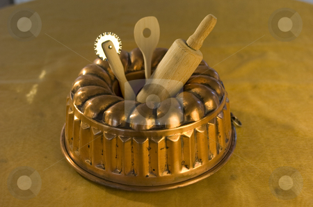 To use this stock image in your creative project, please select the size you need over to the right and click the "Add to Cart" button.
Your downloaded image will come with the Cutcaster watermark removed so don’t worry about the watermark you see on this page. Cake tin stock photo, Cake pan with other baking utensils by Andreas Brenner