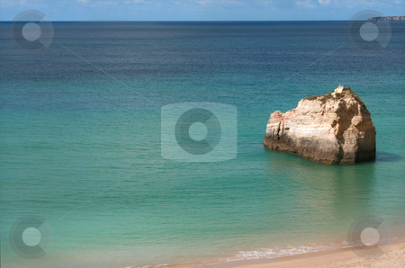 To use this stock image in your creative project, please select the size you need over to the right and click the "Add to Cart" button.
Your downloaded image will come with the Cutcaster watermark removed so don’t worry about the watermark you see on this page. Coast stock photo, Rocks on the beach by Marc Torrell
