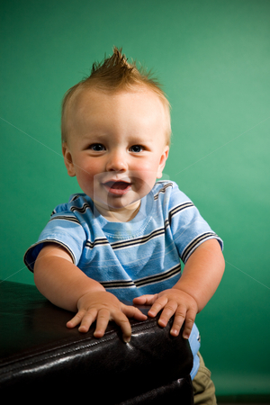 To use this stock image in your creative project, please select the size you need over to the right and click the "Add to Cart" button.
Your downloaded image will come with the Cutcaster watermark removed so don’t worry about the watermark you see on this page. Nine Month Old Boy stock photo, A portrait of a cute nine month old baby boy. by Travis Manley