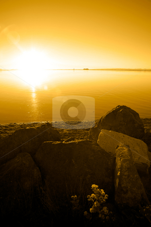 To use this stock image in your creative project, please select the size you need over to the right and click the "Add to Cart" button.
Your downloaded image will come with the Cutcaster watermark removed so don’t worry about the watermark you see on this page. Pacific Northwest Sunset stock photo, Sunset at Cline Spit in Sequim Washington. by Travis Manley