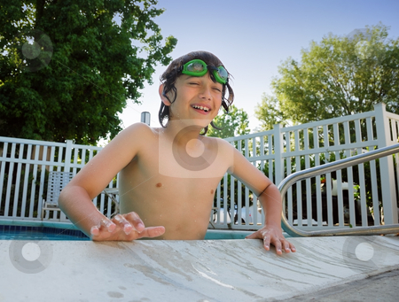 To use this stock image in your creative project, please select the size you need over to the right and click the "Add to Cart" button.
Your downloaded image will come with the Cutcaster watermark removed so don’t worry about the watermark you see on this page. Pool Fun stock photo, Teen boy with swimming goggles having fun at the pool. by Denis Radovanovic