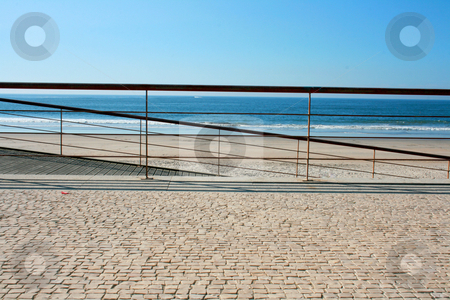 To use this stock image in your creative project, please select the size you need over to the right and click the "Add to Cart" button.
Your downloaded image will come with the Cutcaster watermark removed so don’t worry about the watermark you see on this page. Handrail beach stock photo, Iron handrail of a Mediterranean beach by Marc Torrell