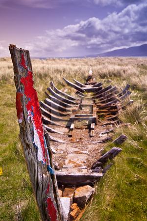 To use this stock image in your creative project, please select the size you need over to the right and click the "Add to Cart" button.
Your downloaded image will come with the Cutcaster watermark removed so don’t worry about the watermark you see on this page. Shipwreck stock photo, Shipwreck of traditional Irish rowing boat currach by Dirk Ercken