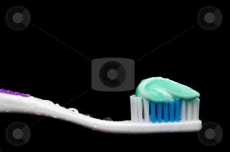 To use this stock image in your creative project, please select the size you need over to the right and click the "Add to Cart" button.
Your downloaded image will come with the Cutcaster watermark removed so don’t worry about the watermark you see on this page. A horizontal closeup of a manual toothbrush with a glob of tooth stock photo, A horizontal closeup of a manual toothbrush with a glob of toothpaste and water droplets on a black background by Vince Clements
