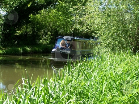 To use this stock image in your creative project, please select the size you need over to the right and click the "Add to Cart" button.
Your downloaded image will come with the Cutcaster watermark removed so don’t worry about the watermark you see on this page. Canal scene stock photo, Barge, canal, summer, leisurely by Lee Measures