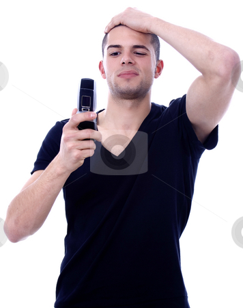 To use this stock image in your creative project, please select the size you need over to the right and click the "Add to Cart" button.
Your downloaded image will come with the Cutcaster watermark removed so don’t worry about the watermark you see on this page. Sms stock photo, Astonished young man reading a sms by Marc Torrell