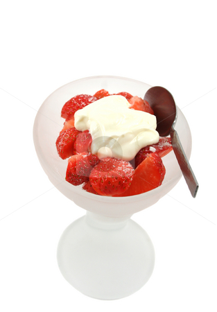 To use this stock image in your creative project, please select the size you need over to the right and click the "Add to Cart" button.
Your downloaded image will come with the Cutcaster watermark removed so don’t worry about the watermark you see on this page. Strawberies and Cream in Dish with Spoon stock photo, Sliced strawberries with a light sprinkling of sugar and a dollop of creme fraiche or fresh cream in a frosted glass dessert bowl with spoon by Helen Shorey