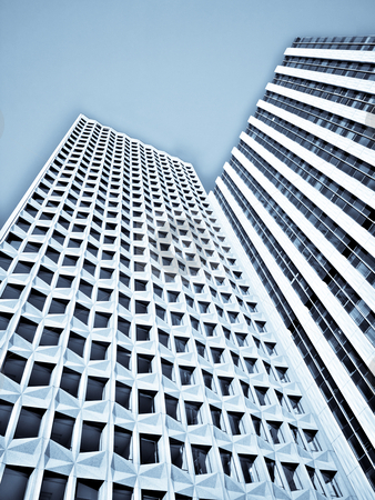 To use this stock image in your creative project, please select the size you need over to the right and click the "Add to Cart" button.
Your downloaded image will come with the Cutcaster watermark removed so don’t worry about the watermark you see on this page. Modern skyscrapers stock photo, Skyward view of two skyscrapers under blue sky hdr processed and selenium filter applied by Laurent Dambies