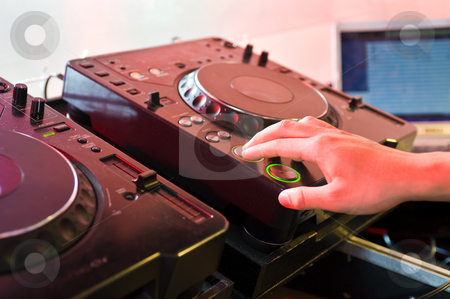 To use this stock image in your creative project, please select the size you need over to the right and click the "Add to Cart" button.
Your downloaded image will come with the Cutcaster watermark removed so don’t worry about the watermark you see on this page. Turntable stock photo, DJ with his hands on the buttons of a turntable by Corepics VOF