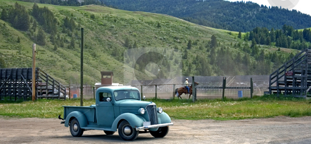 To use this stock image in your creative project, please select the size you need over to the right and click the "Add to Cart" button.
Your downloaded image will come with the Cutcaster watermark removed so don’t worry about the watermark you see on this page. Cowboy's Old Truck stock photo, This shot shows a small town authentic rodeo complete with a cowboy's old truck. by Valerie Garner