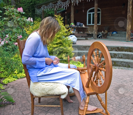 To use this stock image in your creative project, please select the size you need over to the right and click the "Add to Cart" button.
Your downloaded image will come with the Cutcaster watermark removed so don’t worry about the watermark you see on this page. Self Employed Business Woman Working stock photo, This artisan woman is hand crafting wool into homespun yard using a spinning wheel at her home in which she is self employed in this as a business. by Valerie Garner