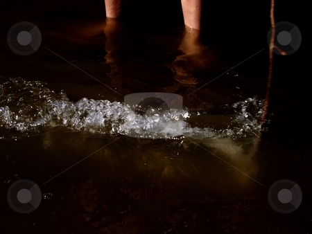 To use this stock image in your creative project, please select the size you need over to the right and click the "Add to Cart" button.
Your downloaded image will come with the Cutcaster watermark removed so don’t worry about the watermark you see on this page. Playing in the water stock photo, A person is playing with a branch in the water by Arve Bettum
