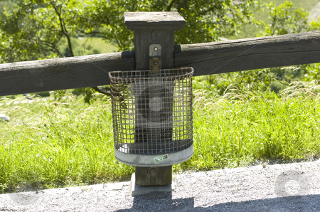 To use this stock image in your creative project, please select the size you need over to the right and click the "Add to Cart" button.
Your downloaded image will come with the Cutcaster watermark removed so don’t worry about the watermark you see on this page. Wire garbage can stock photo, Garbage can made of wire netting outdoors by Andreas Brenner