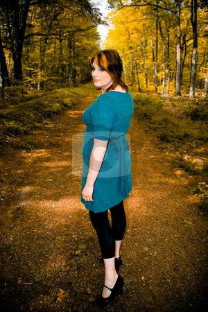 To use this stock image in your creative project, please select the size you need over to the right and click the "Add to Cart" button.
Your downloaded image will come with the Cutcaster watermark removed so don’t worry about the watermark you see on this page. Path Through the Woods stock photo, A young woman posing on a wooded path. by Todd Arena