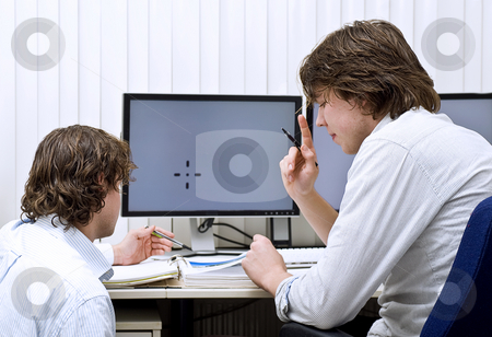 To use this stock image in your creative project, please select the size you need over to the right and click the "Add to Cart" button.
Your downloaded image will come with the Cutcaster watermark removed so don’t worry about the watermark you see on this page. Explanation and understanding stock photo, Two co-workers disscussing a thick dossier, one rasing his finger in understanding. by Corepics VOF