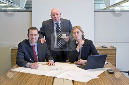 To use this stock image in your creative project, please select the size you need over to the right and click the "Add to Cart" button.
Your downloaded image will come with the Cutcaster watermark removed so don’t worry about the watermark you see on this page. Business team stock photo, A business team working together on an architectural design by Corepics VOF